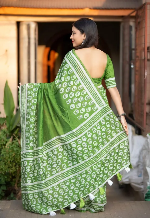 Green_Block_Printed_Cotton_Saree_With_Floral_Motifs_And_Tassel_Border_For_Women