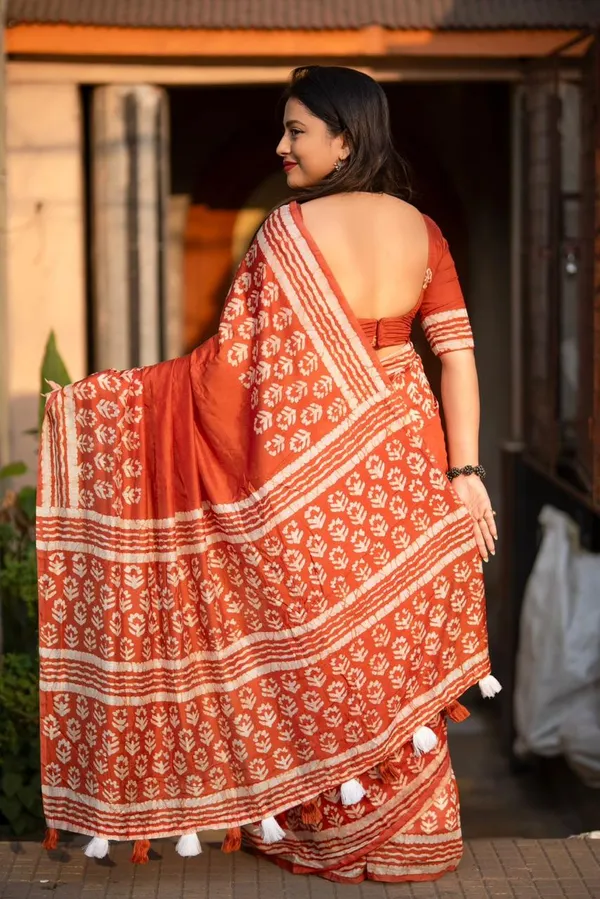 Orange_Block_Print_Cotton_Saree_With_Pom_Pom_Tassels_And_Matching_Blouse_For_Women