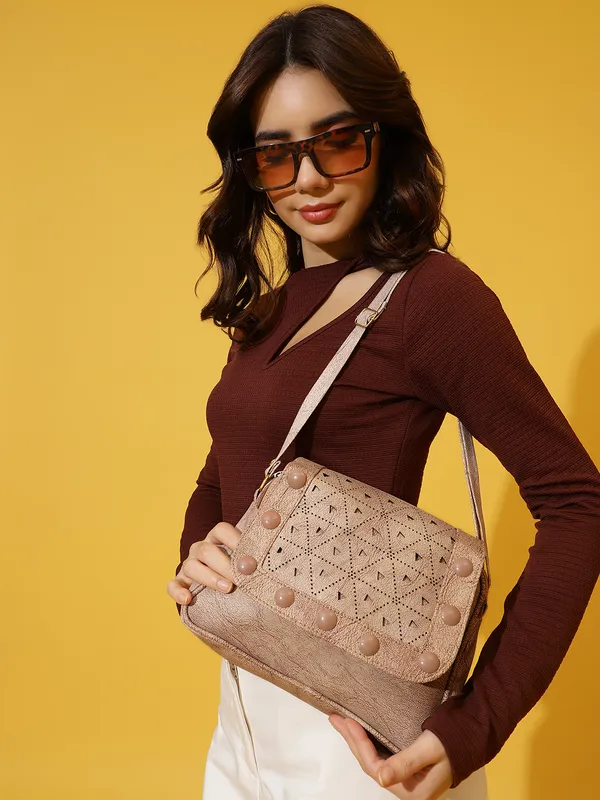 Beige_Textured_Sling_Bag_With_Cutwork_Design