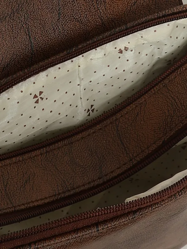 Brown_Textured_Sling_Bag_With_Cutwork_Design