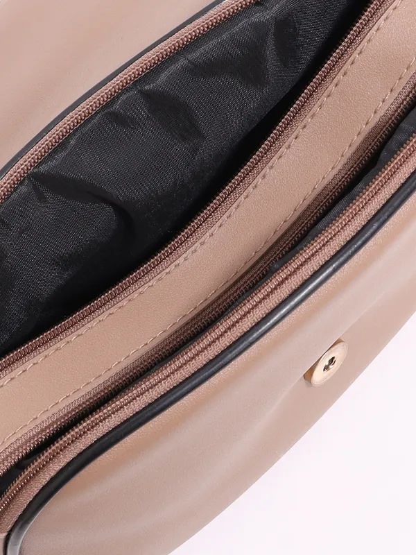 Nude_Brown_Sling_Bag_With_Tassel_&_Zipper_Detail