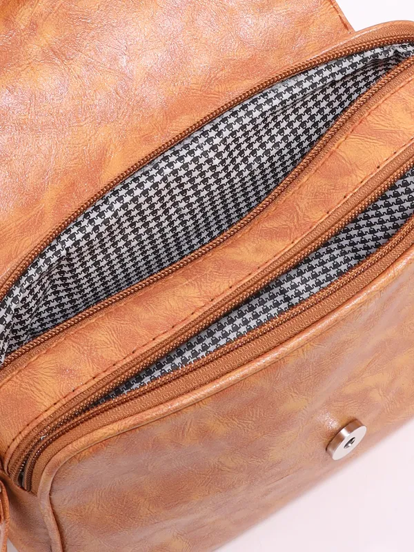 Tan_Textured_Sling_Bag_With_Cutwork_Design
