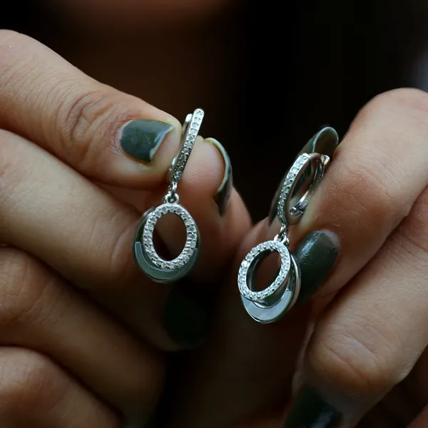 Diamond_Halo_Gleam:_Sterling_Silver_Circular_Earring_For_Women