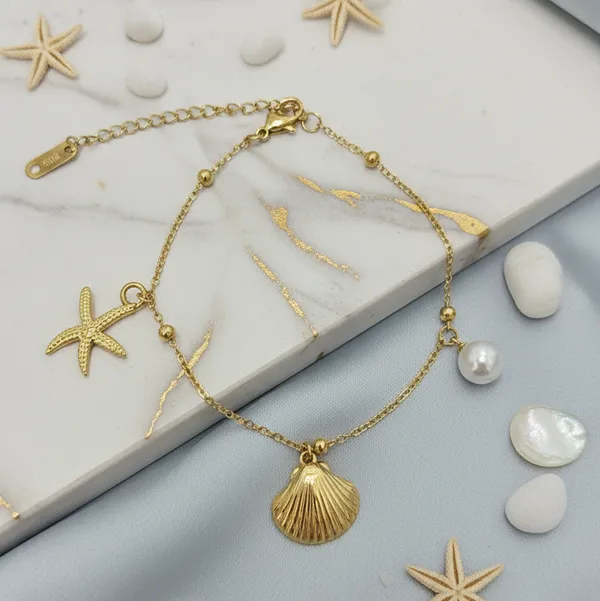 Golden_Seashell_&_Starfish_Charm_Bracelet_With_Pearl_Accent
