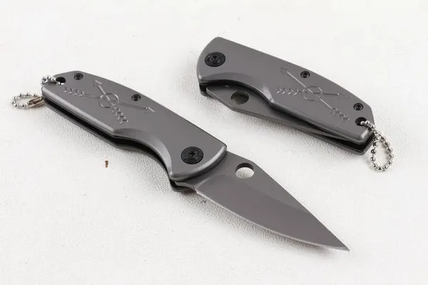 Engraved_Steel_Handle_Folding_Knife
