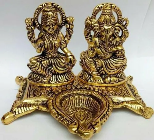 Golden_Metal_Laxmi_Ganesh_Idol_Pair_With_Diya_For_Diwal_Puja