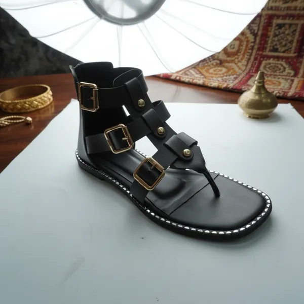 Black_Gladiator_Sandals_for_Women_–_Gold_Buckle_Strappy_Designer_Flat_Sandals