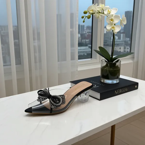 Seraphine_Crystal-Bow_Lucite-Heel_Slide_–_Mocha_Nude