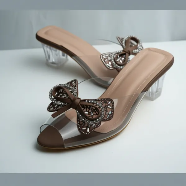 Seraphine_Crystal-Bow_Lucite-Heel_Slide_–_Mocha_Nude