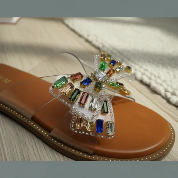 Women’s_Crystal_Bow_Flat_Slide_Sandals_with_Transparent_Straps_–_Luxury_Embellished_Summer_Slides