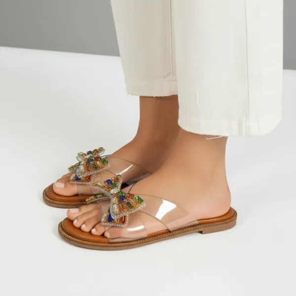 Women’s_Crystal_Bow_Flat_Slide_Sandals_with_Transparent_Straps_–_Luxury_Embellished_Summer_Slides