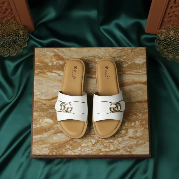Women’s_Ivory_Slide_Sandals_with_Gold_Emblem_–_Stylish_Comfortable_Flats_