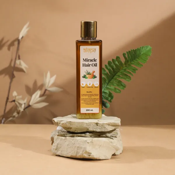 Revitalize_Hair_Growth_Miracle_Hair_Oil_Infused_With_46_Herbal_Blend_200_Ml