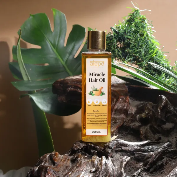 Revitalize_Hair_Growth_Miracle_Hair_Oil_Infused_With_46_Herbal_Blend_200_Ml