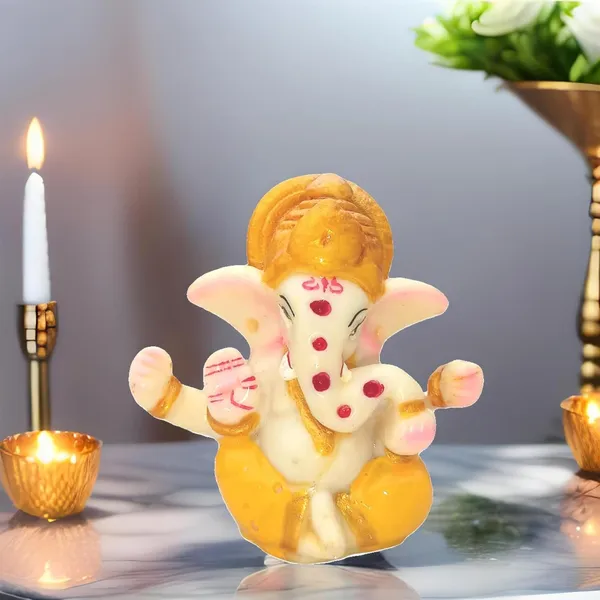 Ganesh_Idol_for_Home_2.5-inch_Polyresin_Ganesha_Murti_for_Pooja,_Ganesh_Idol_Marble_dust__White_&_Golden_Ganpati_Statue,_Ganesh_Ji_murti_for_Good_Fortune_Ganesha_Idol.