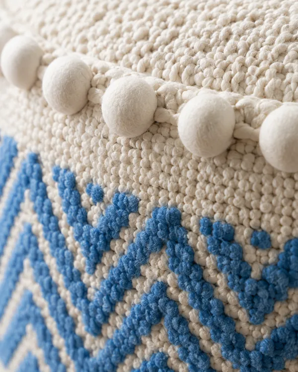 Blue_Boho_Handwoven_Ottoman_Stool_with_Pom-Pom_Detailing