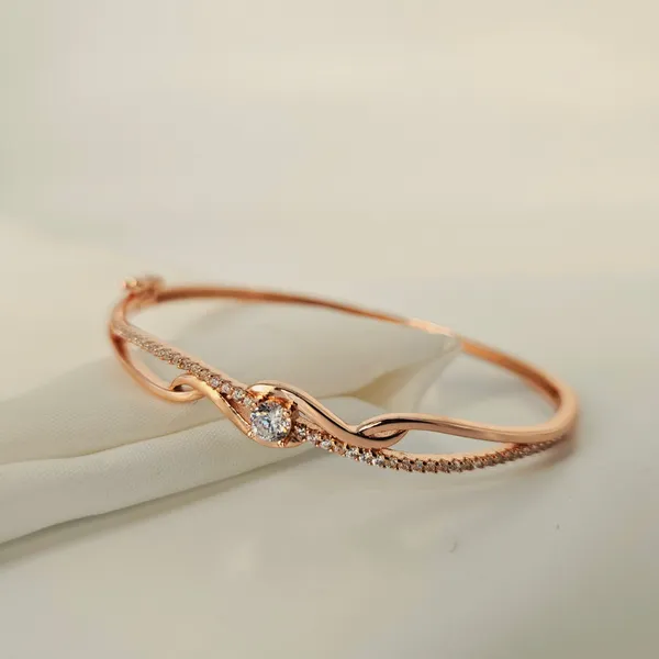 Interlocking_Wave_Rose_Gold_Bracelet