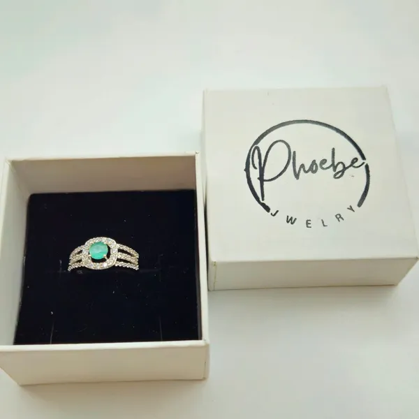 Green_Gemstone_Halo_Ring_With_A_Pave_Split-Shank_Band