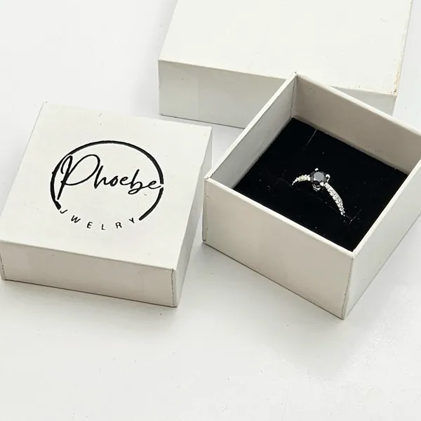 Black_Gemstone_Solitaire_Ring_With_A_Pave_Band