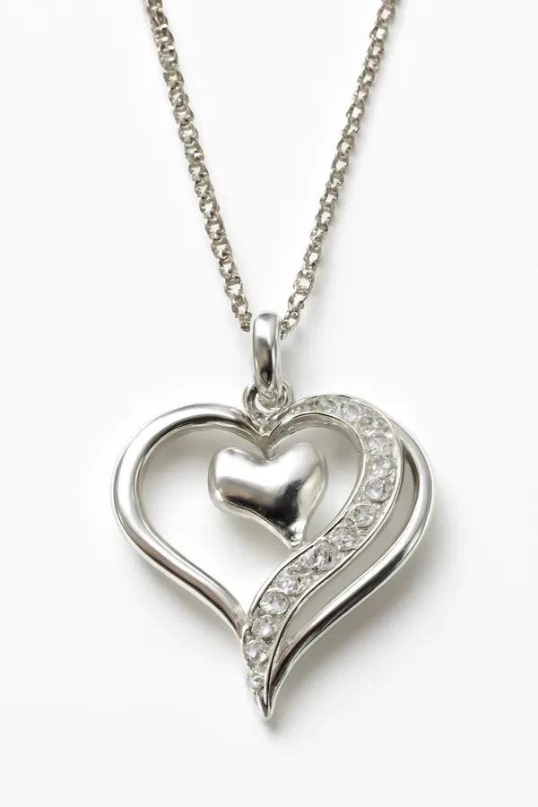 Silver_Floating_Heart_Pendant_With_A_Pave_Swoop