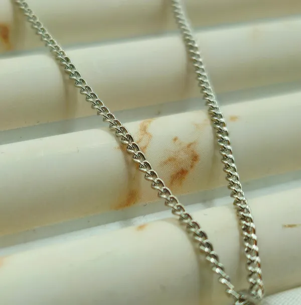 Silver_Floating_Heart_Pendant_With_A_Pave_Swoop