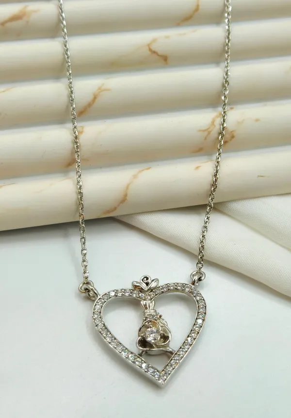 Silver_Sideways_Heart_Pendant_With_Rose_Solitaire