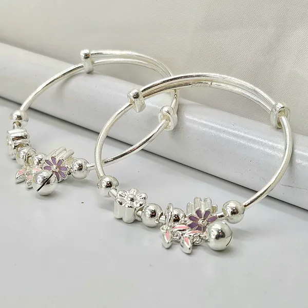 Silver_Baby_Bangles_With_Floral_Charms_And_Jingle_Bell