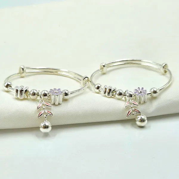 Silver_Baby_Bangles_With_Floral_Charms_And_Jingle_Bell