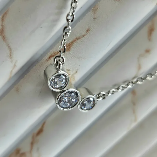 Modern_Three-Stone_Bezel_Set_Journey_Pendant