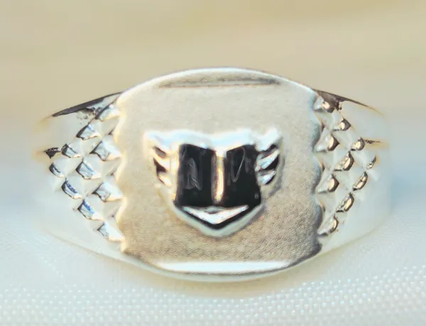 Silver_Winged_Shield_Signet_Ring_With_Diamond-Pattern_Shoulders