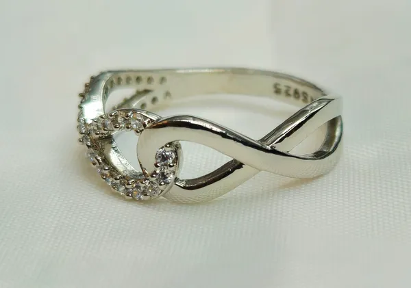 Pave_Criss-Cross_Infinity_Ring