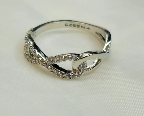 Pave_Criss-Cross_Infinity_Ring