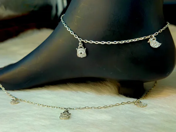 Sparkling_Handbag_And_Bird_Charm_Anklet