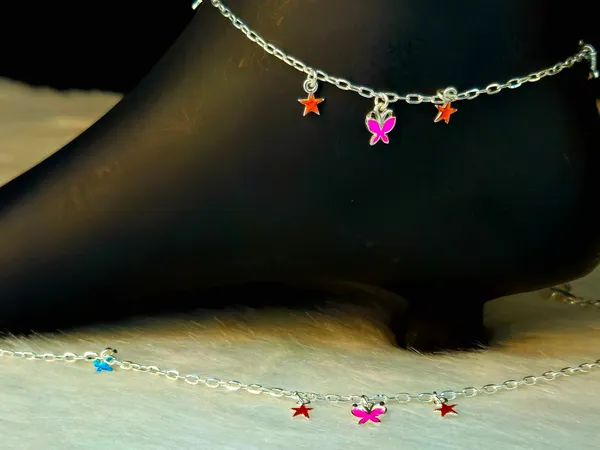 Silver-Toned_Butterfly_And_Star_Charm_Anklet