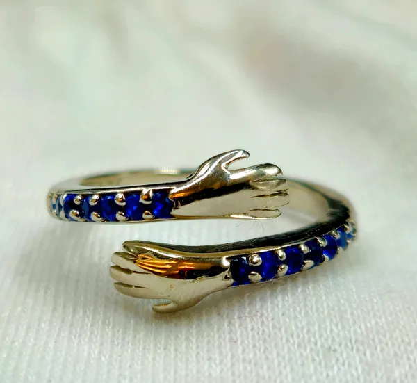 Blue_Gemstone_Hugging_Hands_Ring