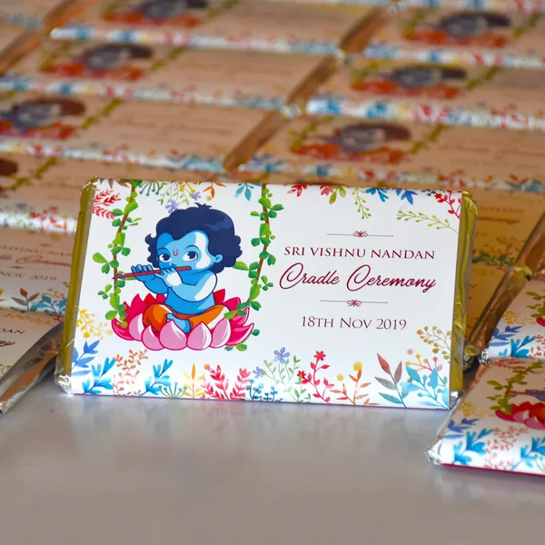 Baby_Shower_Return_Gifts_(12_Bars),_Personalised_Chocolate_Bar_-_Krishna_And_Floral_Design