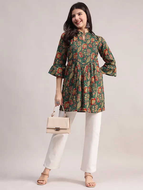 Green_Ethnic_Floral_Printed_Tunic_-_With_Red_&_Gold_Accents,_Pin-Tucked_Front,_And_Flared_Hem_For_Women