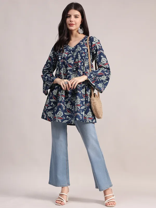 Navy_Blue_Cotton_Tunic_With_Red_And_White_Floral_Print,_Pin-Tuck_Detailing,_And_Flared_Sleeves_For_Women