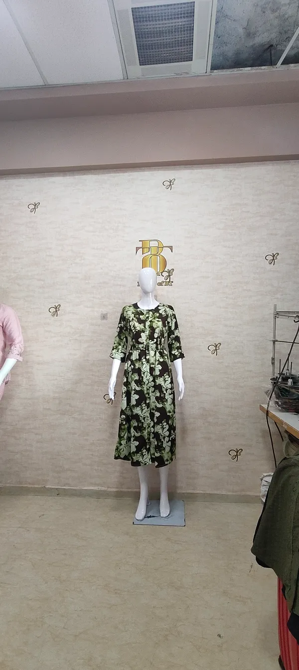 Green_Poly_Floral_Flared_Dress_For_Women_&_Girls