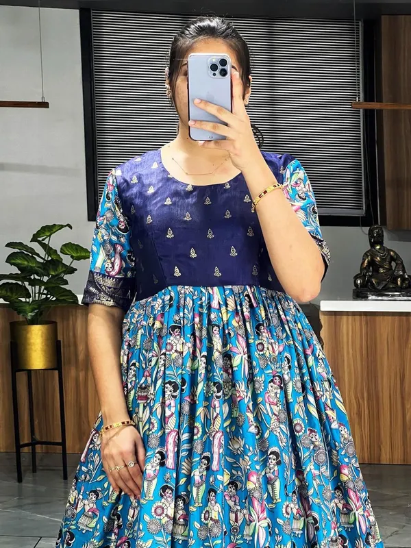 Blue_Premium_Kalamkari_Soft_Dola_Silk_Gown_with_Foil_Work_Border_–_Adjustable_Free_Size_Gown_Collections
