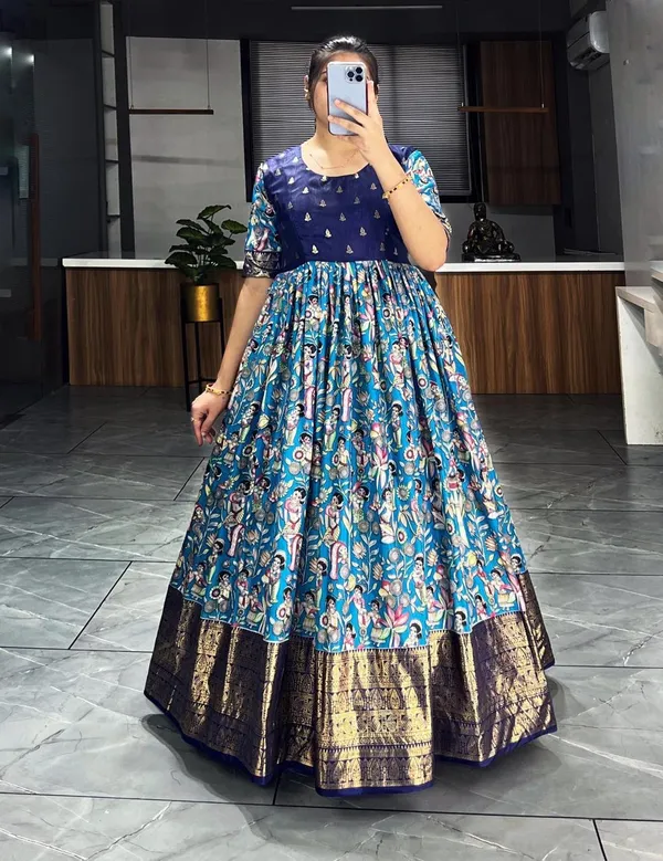 Blue_Premium_Kalamkari_Soft_Dola_Silk_Gown_with_Foil_Work_Border_–_Adjustable_Free_Size_Gown_Collections
