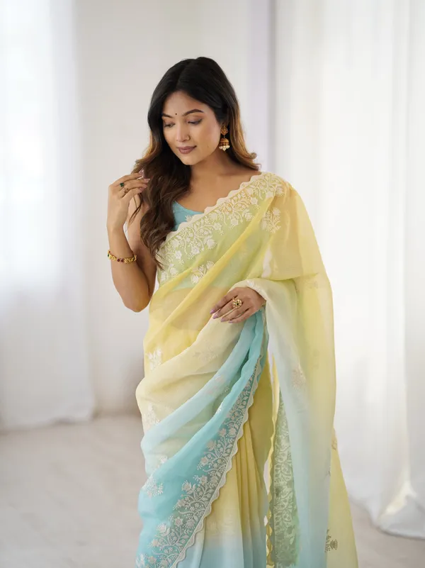 Yellow_&_Sky_Blue_Trendy_Crunchy_Pedding_With_Heavy_Cotton_Thread_Embroidery_Work_Saree