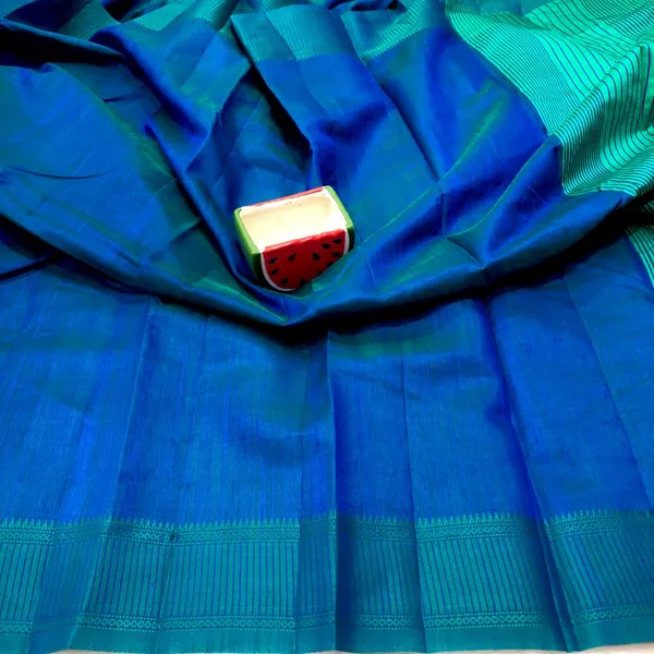 Teal_Blue_Raw_Silk_Dual_Tone_Saree_With_Blouse_Piece_For_Women