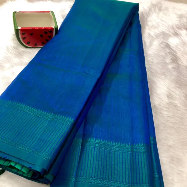 Teal_Blue_Raw_Silk_Dual_Tone_Saree_With_Blouse_Piece_For_Women