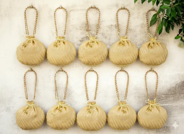 Bandhani_Style_Round_Potli_Bag_with_Golden_Handle_-_Cream