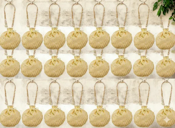 Bandhani_Style_Round_Potli_Bag_with_Golden_Handle_-_Cream
