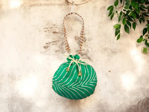 Bandhani_Style_Round_Potli_Bag_with_Golden_Handle_-_Green