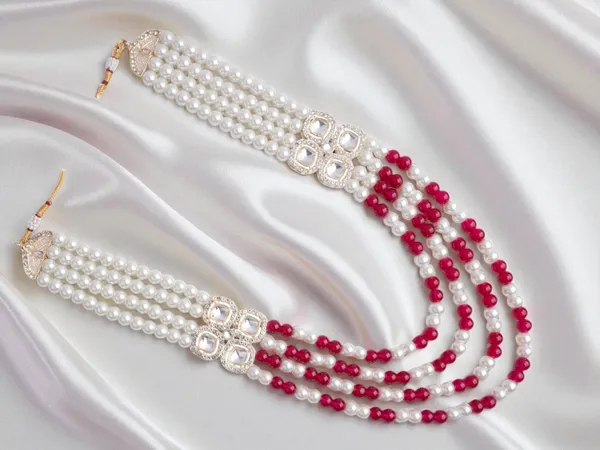 Contemporary_Indian_Groom_Haar_With_Pastel_Pearl_Finish-_Rani_Pink