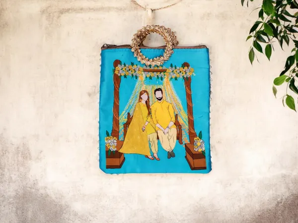 Haldi_Themed_Potli_Bag_With_Designer_Handle_-_Blue