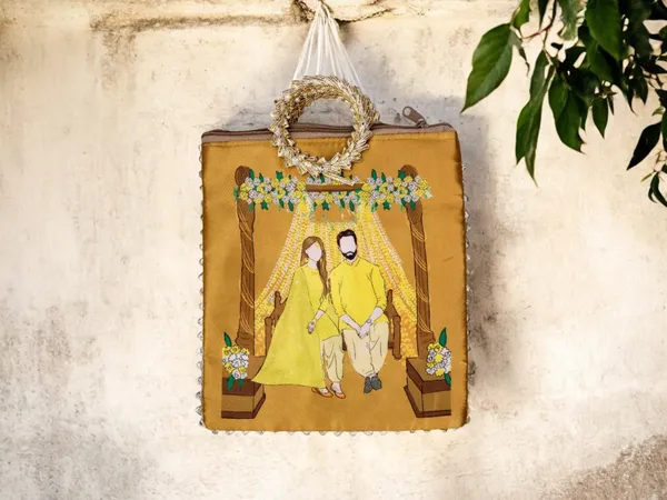 Haldi_Themed_Potli_Bag_With_Designer_Handle